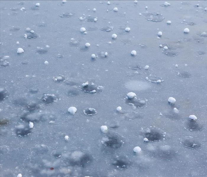 Hail Covering the Ground after Rain Storm